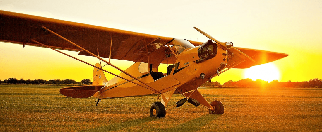 Plane parked at sunset | Classic Aviation, Inc.